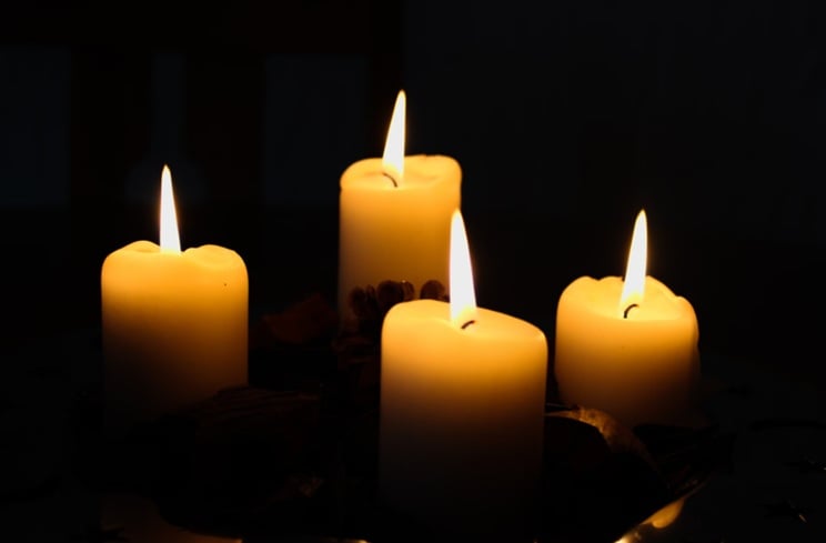 Burning memorial candles representing Deltona, FL cremation services.